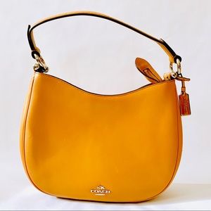 Coach Nomad Glovetanned Leather Handbag